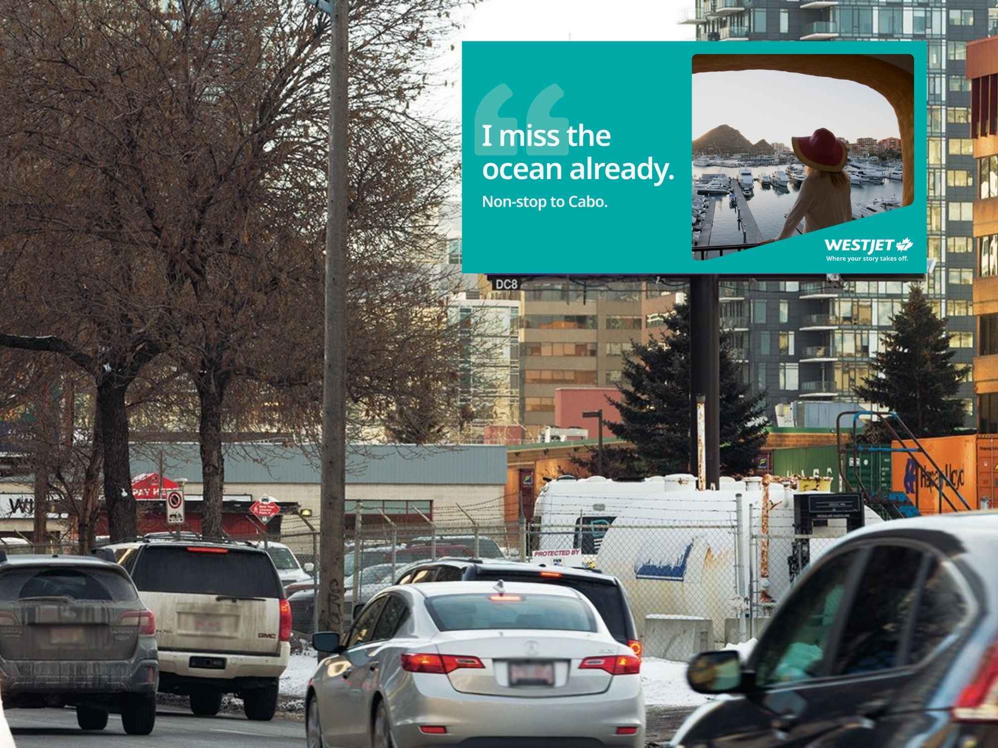 WestJet OOH campaign on an outdoor billboard